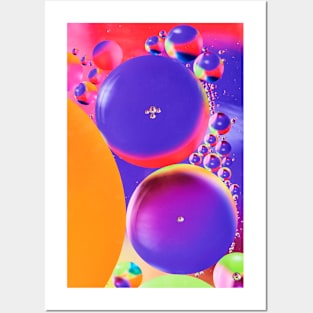 Colorful close up of oil drops in water Posters and Art